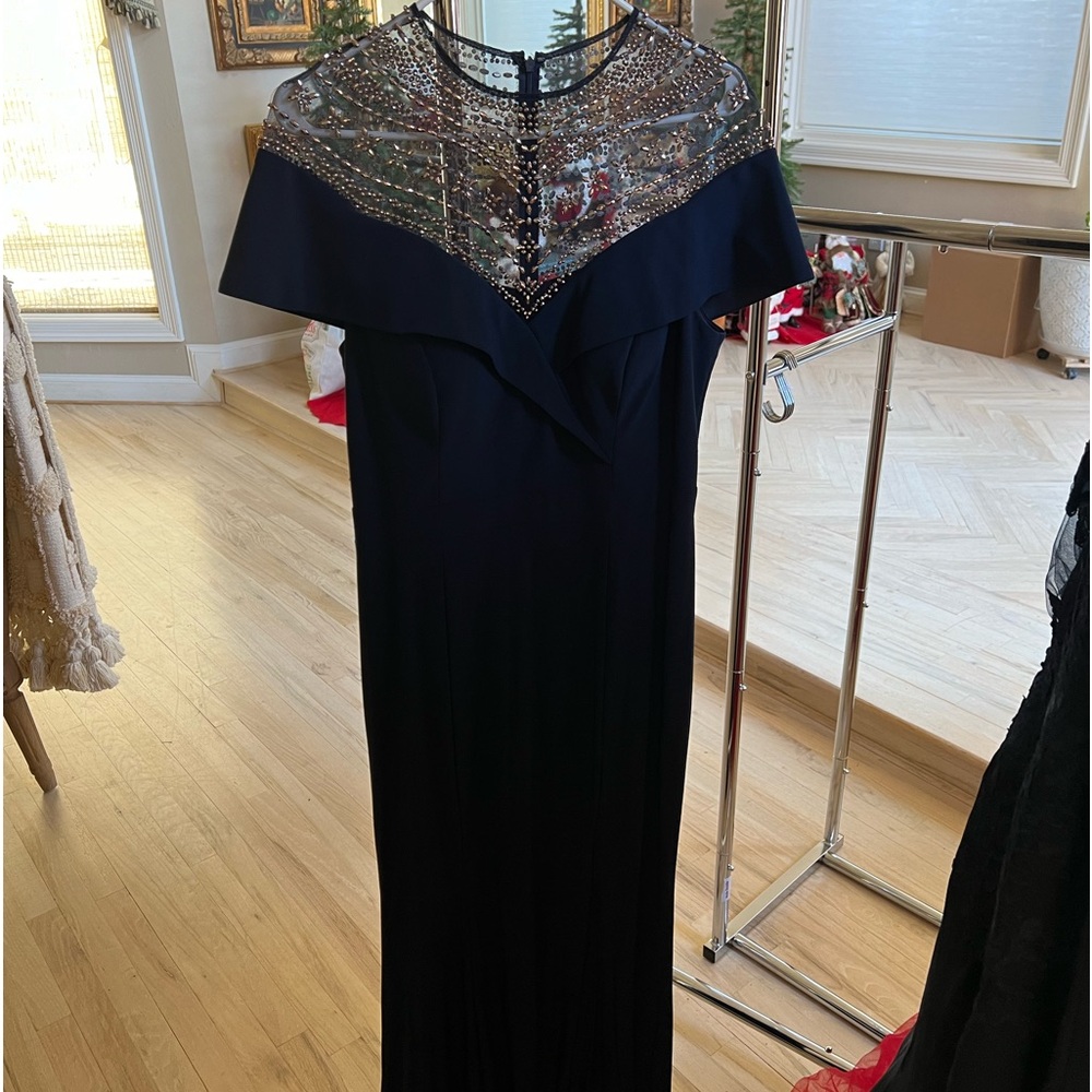 Evening gown, worn once. Navy Blue, with beading.
Beading in perfect condition